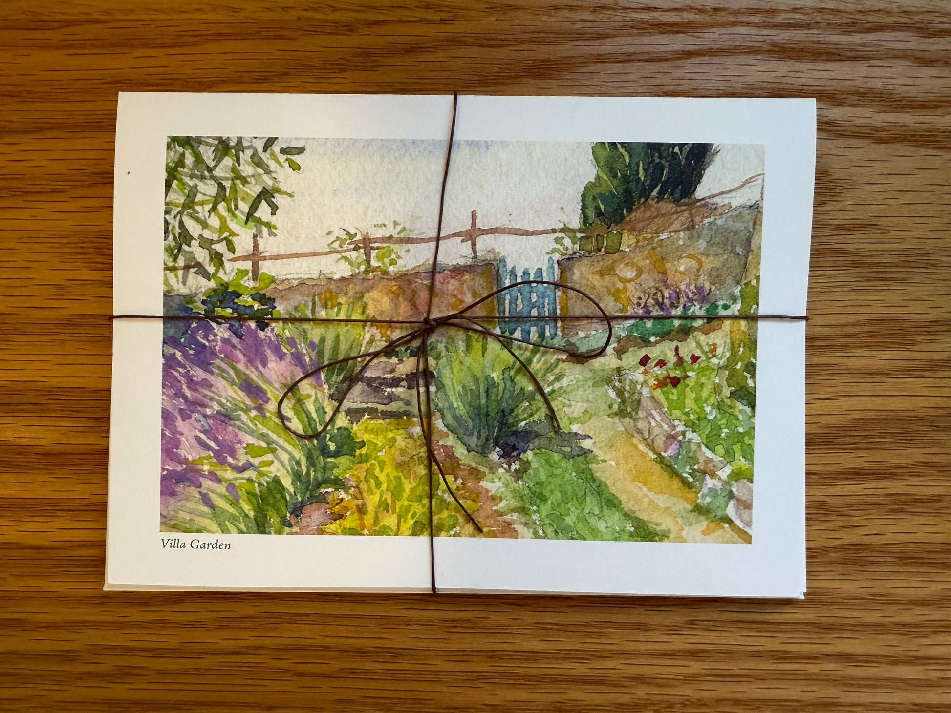 Set of notecards tied with thin hemp cord.