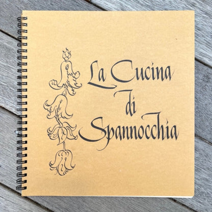The book cover, with "La Cucina di Spannocchia" written in calligraphy by Lee Ann Clark. 