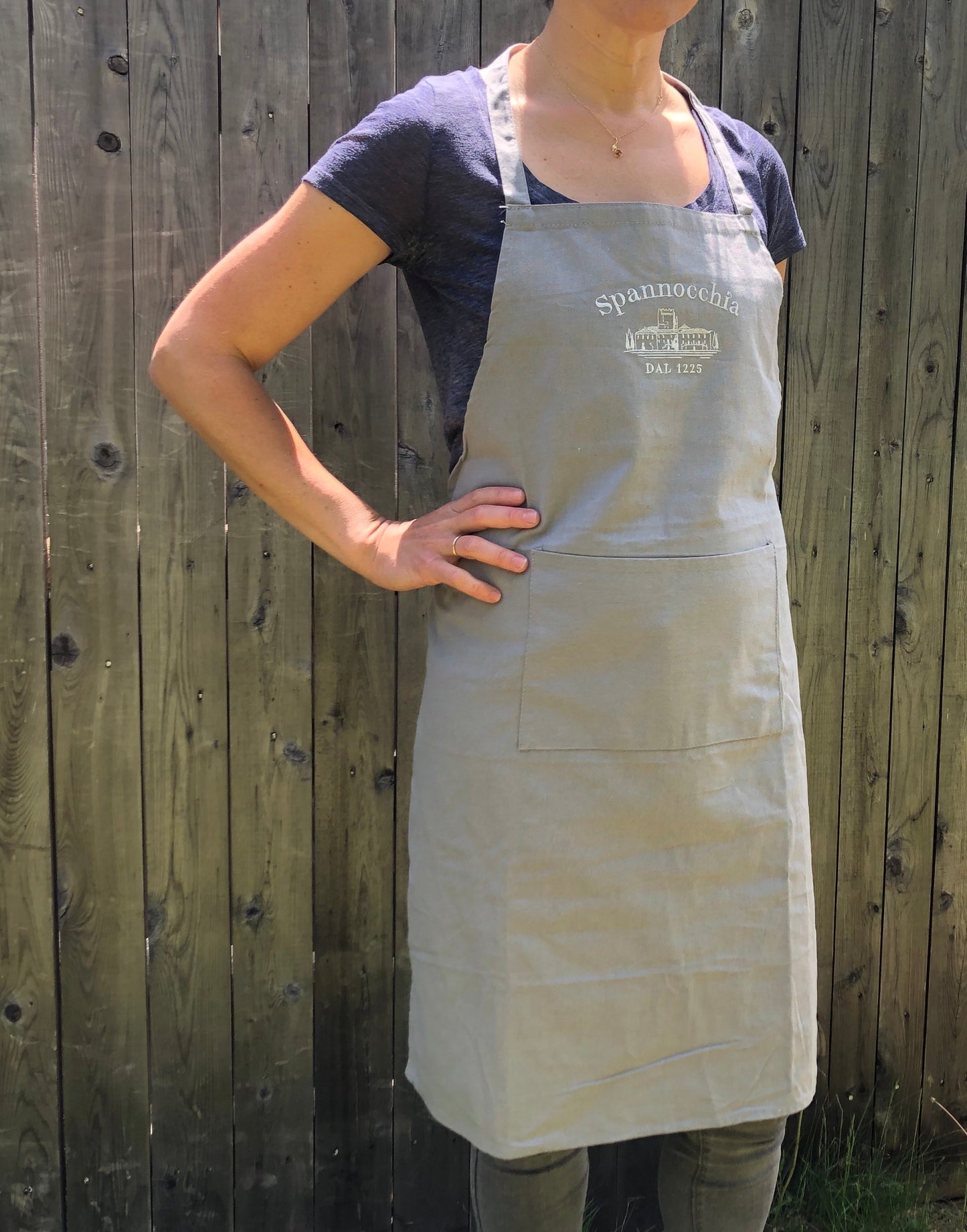 Gray apron on person